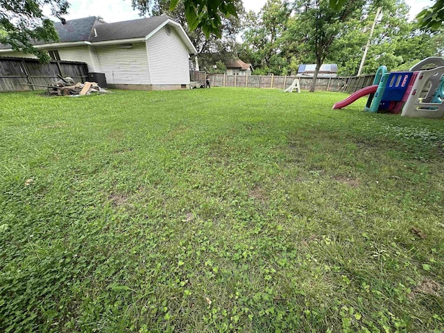 621 W 7th St, Rector, AR 72461 - view of yard featuring a playground