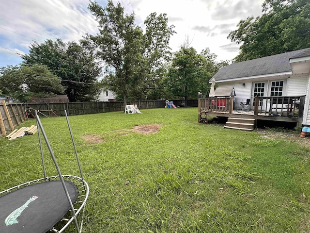 621 W 7th St, Rector, AR 72461 - view of yard with a playground and a deck