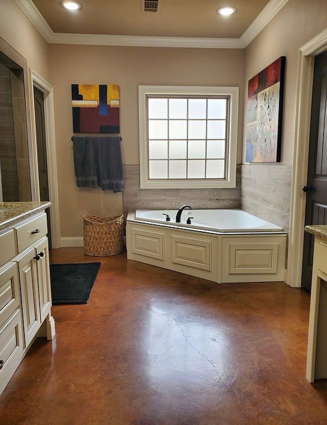 full bathroom featuring concrete flooring, a garden tub, ornamental molding, recessed lighting, and vanity