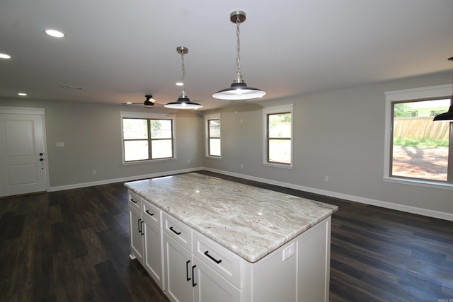 308 N Arch St, Sheridan, AR 72150 - kitchen with open floor plan, dark wood finished floors, baseboards, and recessed lighting