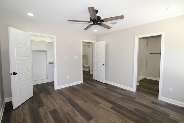 308 N Arch St, Sheridan, AR 72150 - unfurnished bedroom with a walk in closet, a closet, dark wood-style floors, and recessed lighting