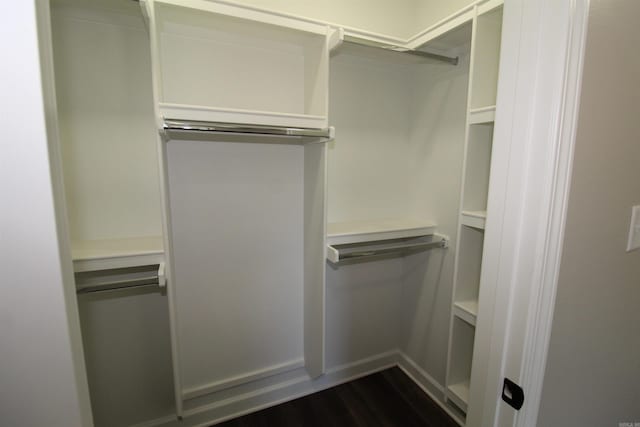 308 N Arch St, Sheridan, AR 72150 - walk in closet with dark wood finished floors