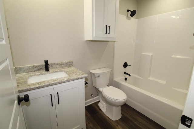 308 N Arch St, Sheridan, AR 72150 - full bathroom with toilet, wood finished floors, shower / bathtub combination, vanity, and baseboards