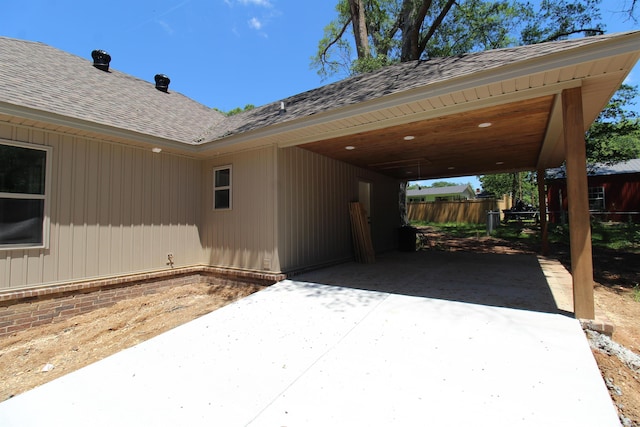 308 N Arch St, Sheridan, AR 72150 - view of patio featuring a carport and driveway
