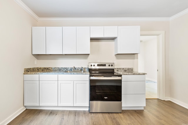 2506 W 6th St, Little Rock, AR 72205 - kitchen featuring stainless steel electric range, light wood-style floors, ornamental molding, light stone countertops, and baseboards