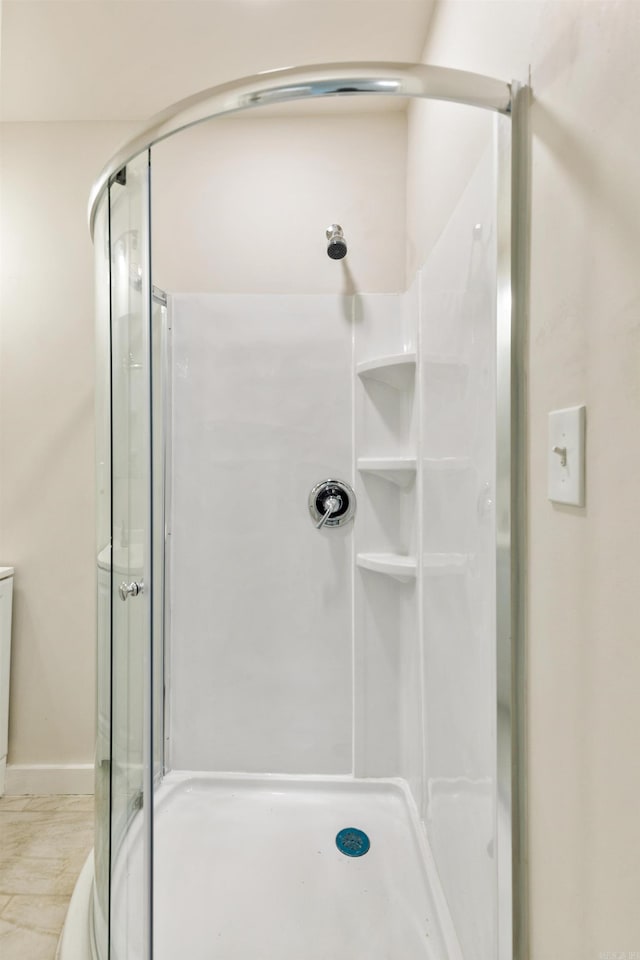 2506 W 6th St, Little Rock, AR 72205 - bathroom with a stall shower and baseboards