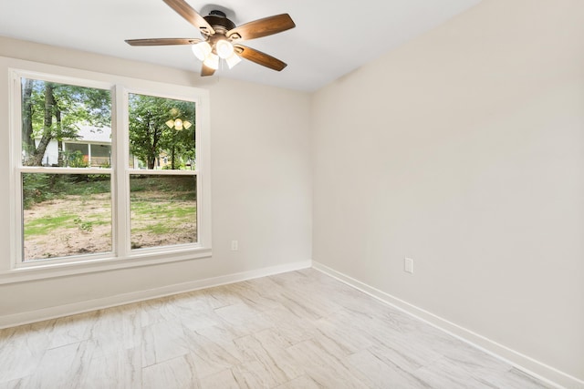 2506 W 6th St, Little Rock, AR 72205 - empty room featuring baseboards and ceiling fan