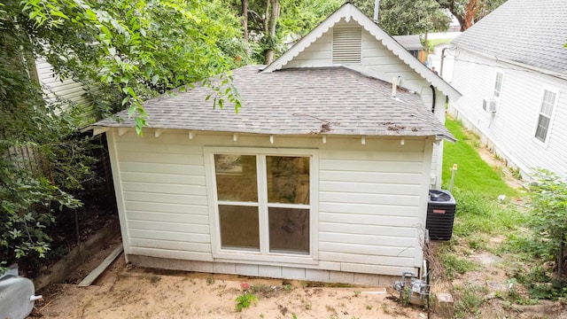 2506 W 6th St, Little Rock, AR 72205 - back of house with a shingled roof and central AC