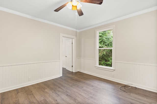 2506 W 6th St, Little Rock, AR 72205 - spare room featuring wainscoting, ceiling fan, wood finished floors, and crown molding