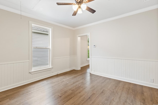 2506 W 6th St, Little Rock, AR 72205 - spare room with a ceiling fan, wood finished floors, ornamental molding, attic access, and a wainscoted wall