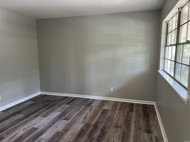 20 Glendale Dr, Little Rock, AR 72209 - spare room featuring dark wood-type flooring and baseboards