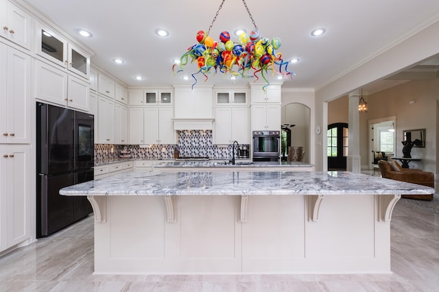 20 Accadia Ct, Little Rock, AR 72223 - kitchen featuring black appliances, ornamental molding, a sink, a breakfast bar, and backsplash