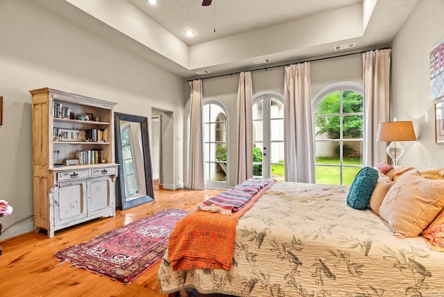 1729 N Spruce, Little Rock, AR 72207 - bedroom with access to outside, light wood-type flooring, french doors, a ceiling fan, and recessed lighting