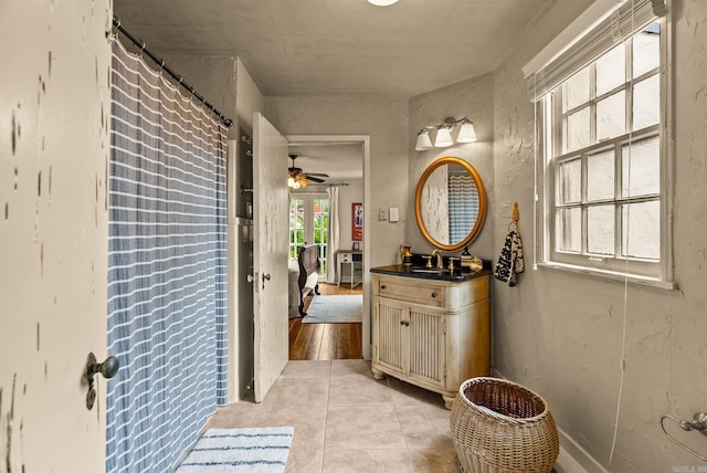 1729 N Spruce, Little Rock, AR 72207 - ensuite bathroom featuring vanity, tile patterned flooring, and a ceiling fan