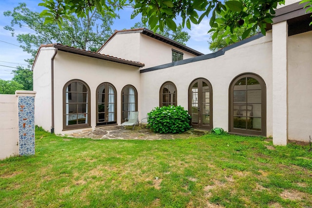 1729 N Spruce, Little Rock, AR 72207 - view of front of home with stucco siding and a front yard