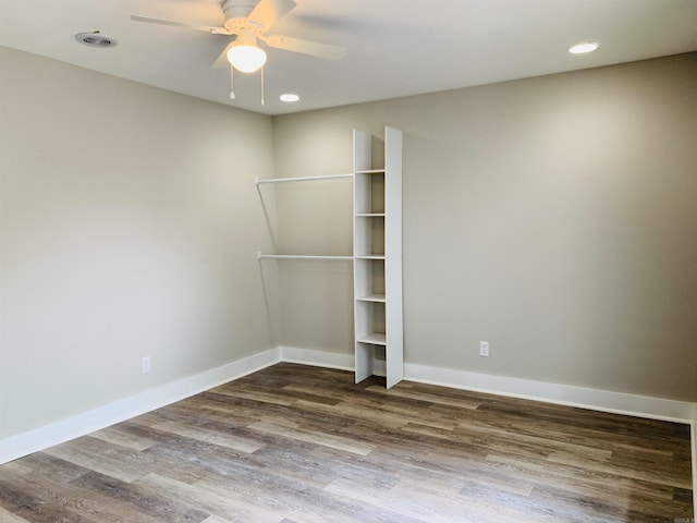 spare room with ceiling fan, dark wood-style floors, baseboards, and recessed lighting