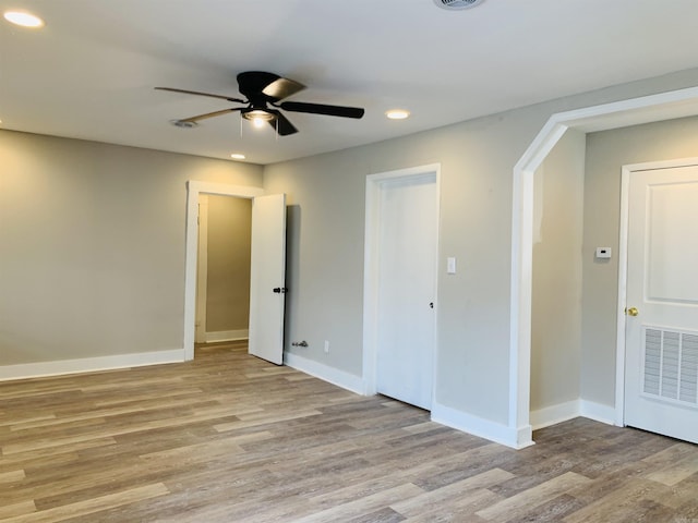 unfurnished bedroom with light wood-style floors, baseboards, recessed lighting, and ceiling fan