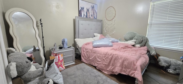 203 Creekwood Dr, Jacksonville, AR 72076 - bedroom featuring wood finished floors