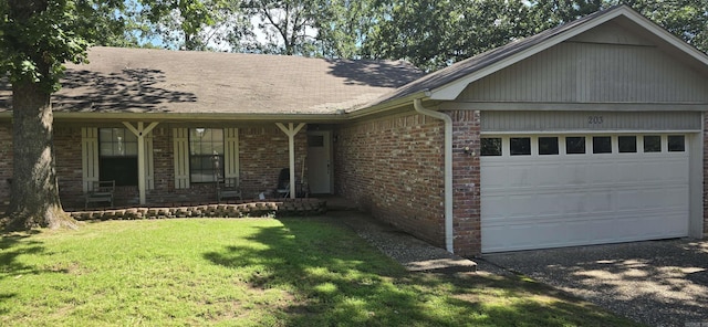 203 Creekwood Dr, Jacksonville, AR 72076 - single story home featuring brick siding, a garage, a front lawn, a porch, and a shingled roof
