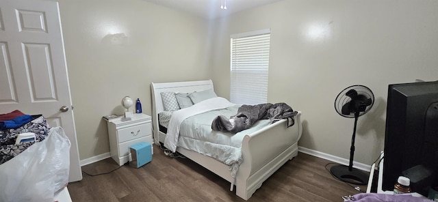 203 Creekwood Dr, Jacksonville, AR 72076 - bedroom featuring wood finished floors and baseboards