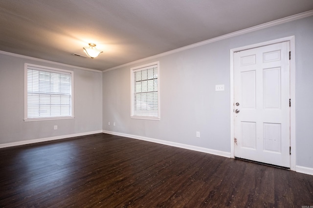 708 N Taylor St, Little Rock, AR 72205 - spare room featuring dark wood-style floors, baseboards, and crown molding