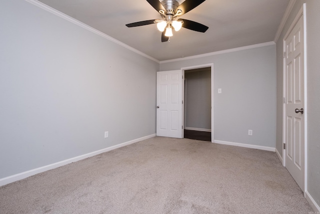 708 N Taylor St, Little Rock, AR 72205 - unfurnished bedroom with ornamental molding, carpet flooring, baseboards, and a ceiling fan
