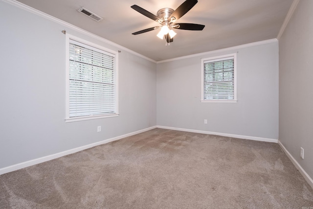 708 N Taylor St, Little Rock, AR 72205 - carpeted empty room featuring crown molding, baseboards, and a ceiling fan