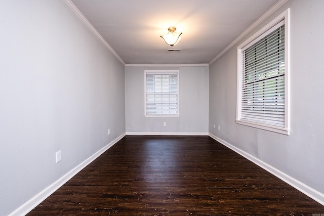 708 N Taylor St, Little Rock, AR 72205 - empty room featuring ornamental molding, wood finished floors, healthy amount of natural light, and baseboards