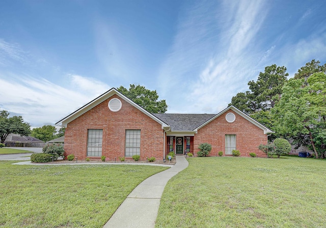 3801 E Castleridge Dr, Texarkana, AR 71854 - view of front of house featuring brick siding, a front lawn, and roof with shingles