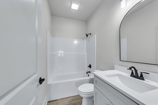 412 N 3rd St, Cabot, AR 72023 - bathroom featuring toilet, vanity, wood finished floors, and shower / bath combination