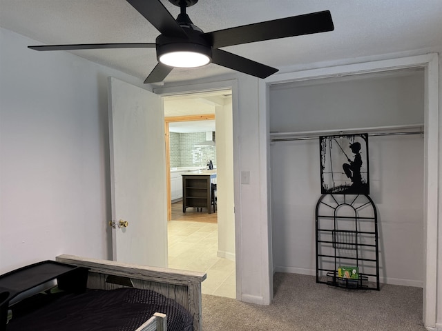 810 N Pear St, Searcy, AR 72143 - carpeted bedroom featuring ceiling fan and baseboards
