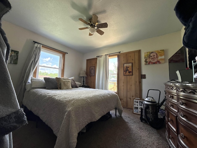 4579 Bayou Access Rd, Mammoth Spring, AR 72554 - bedroom with carpet, a ceiling fan, and access to outside