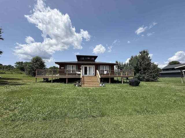 4579 Bayou Access Rd, Mammoth Spring, AR 72554 - rear view of house featuring a deck, french doors, and a yard
