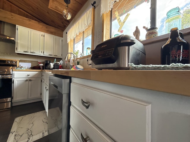 4579 Bayou Access Rd, Mammoth Spring, AR 72554 - kitchen featuring stainless steel range with electric cooktop, vaulted ceiling, wood ceiling, white cabinets, and wall chimney range hood