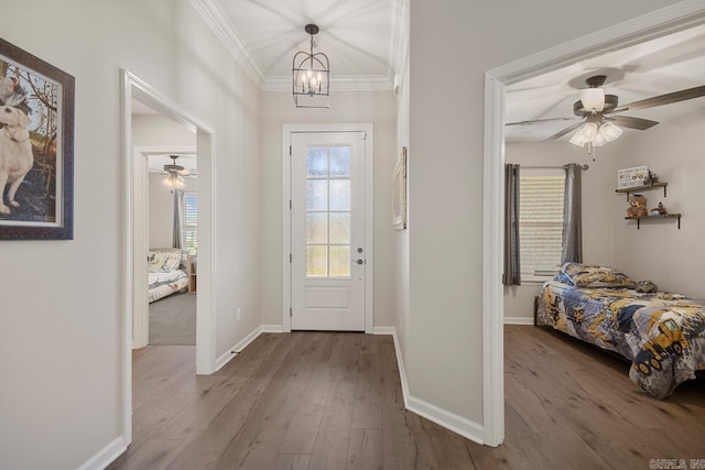 1449 Woolridge Dr, Benton, AR 72019 - entryway with dark wood-style flooring, ornamental molding, baseboards, and a ceiling fan