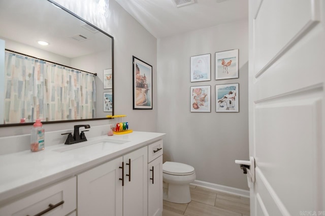 1449 Woolridge Dr, Benton, AR 72019 - full bath featuring toilet, vanity, and baseboards
