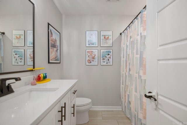 1449 Woolridge Dr, Benton, AR 72019 - full bath with vanity, toilet, a shower with curtain, and baseboards