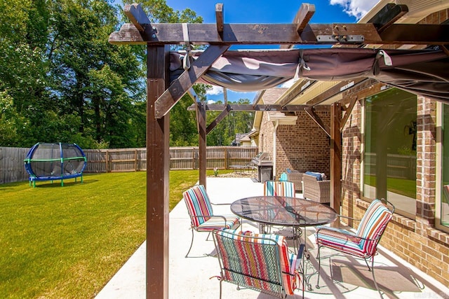 1449 Woolridge Dr, Benton, AR 72019 - view of patio / terrace featuring a trampoline, a pergola, and outdoor dining area