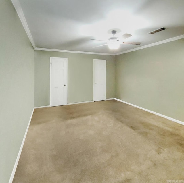 9 Apple Tree Cir, Little Rock, AR 72210 - empty room with crown molding, baseboards, ceiling fan, and carpet