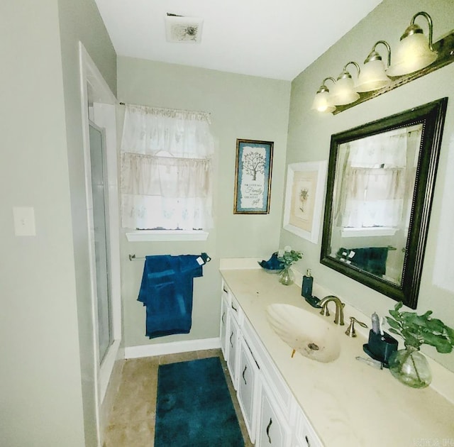 9 Apple Tree Cir, Little Rock, AR 72210 - bathroom with vanity, an enclosed shower, and baseboards