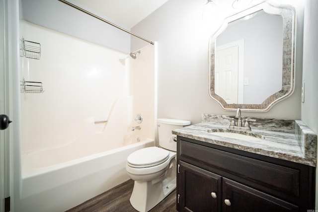 2330 Tyler St, Conway, AR 72034 - bathroom featuring toilet, vanity, shower / tub combination, and wood finished floors