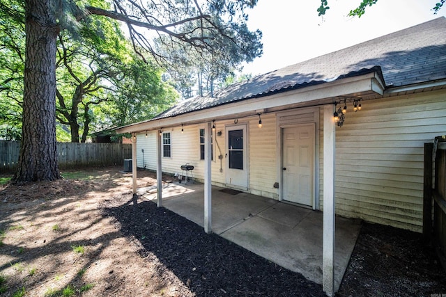 2330 Tyler St, Conway, AR 72034 - back of house with a patio area and central AC unit
