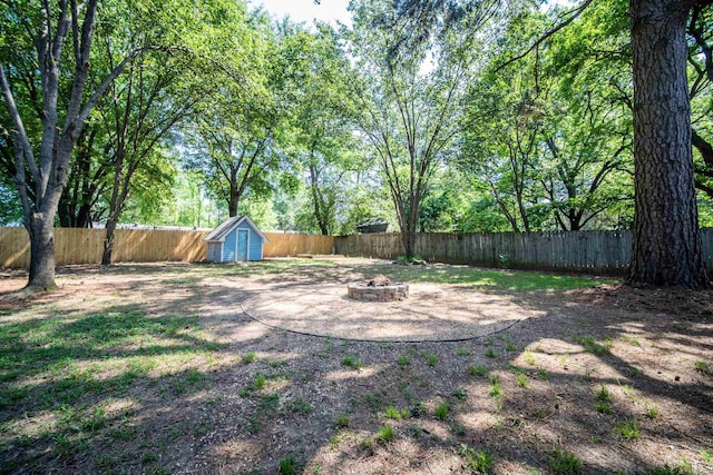 2330 Tyler St, Conway, AR 72034 - fenced backyard featuring a fire pit