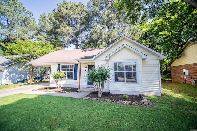 2330 Tyler St, Conway, AR 72034 - single story home with driveway, a front lawn, and a carport