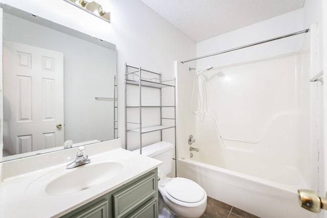 1117 Troy Dr, Benton, AR 72019 - bathroom with toilet, vanity,  shower combination, a textured ceiling, and tile patterned floors