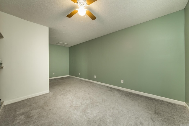 1117 Troy Dr, Benton, AR 72019 - carpeted empty room with ceiling fan, baseboards, and a textured ceiling
