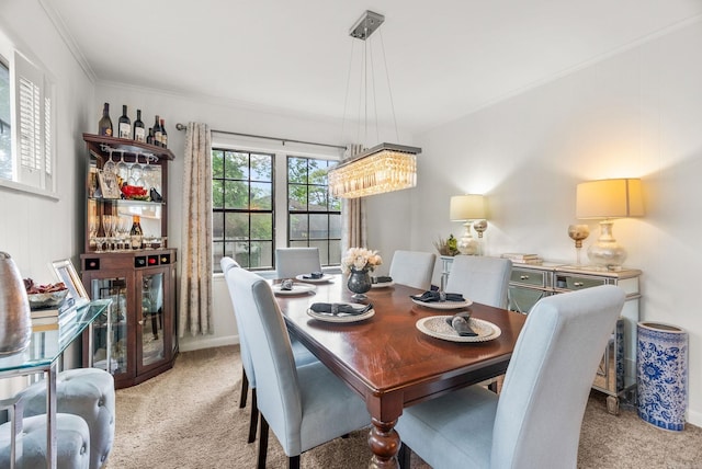 7521 Gable, Little Rock, AR 72205 - dining space with light colored carpet, crown molding, and a chandelier