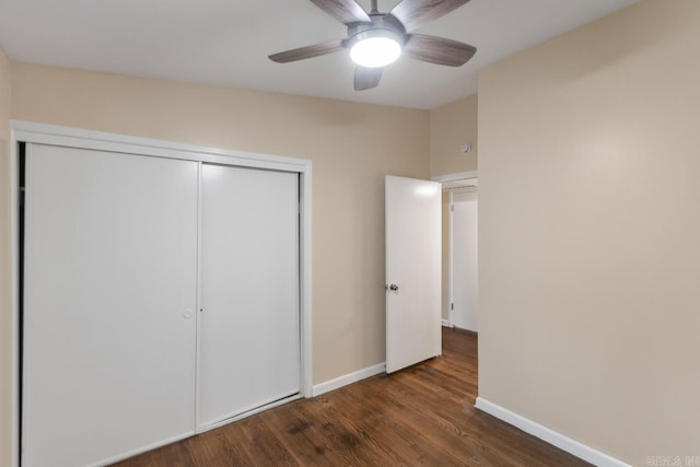 18 Woodcliff Cir, Little Rock, AR 72204 - unfurnished bedroom featuring wood finished floors, baseboards, a closet, and a ceiling fan