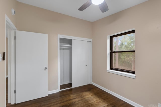 18 Woodcliff Cir, Little Rock, AR 72204 - unfurnished bedroom with a closet, wood finished floors, baseboards, and a ceiling fan
