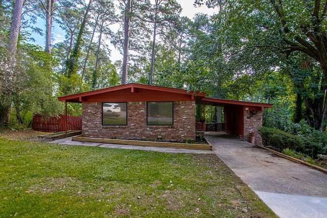 18 Woodcliff Cir, Little Rock, AR 72204 - view of front of house featuring brick siding and driveway